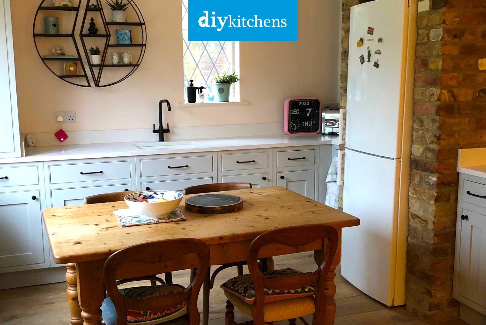 Sage green kitchen in a renovated Victorian home, Southport